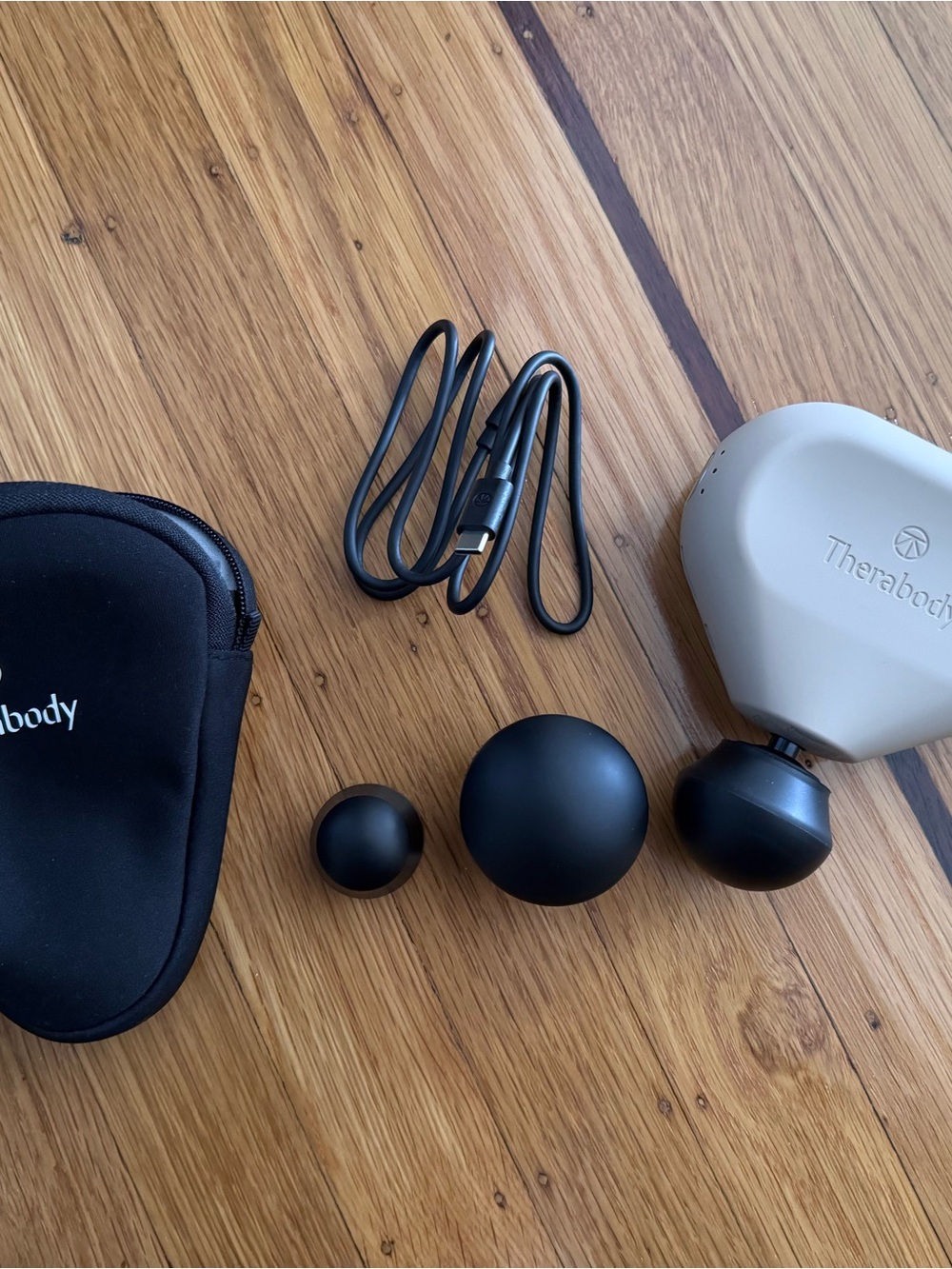 Therabody Mini 3rd gen Percussion Massager in Cream/rose with Black Attachments